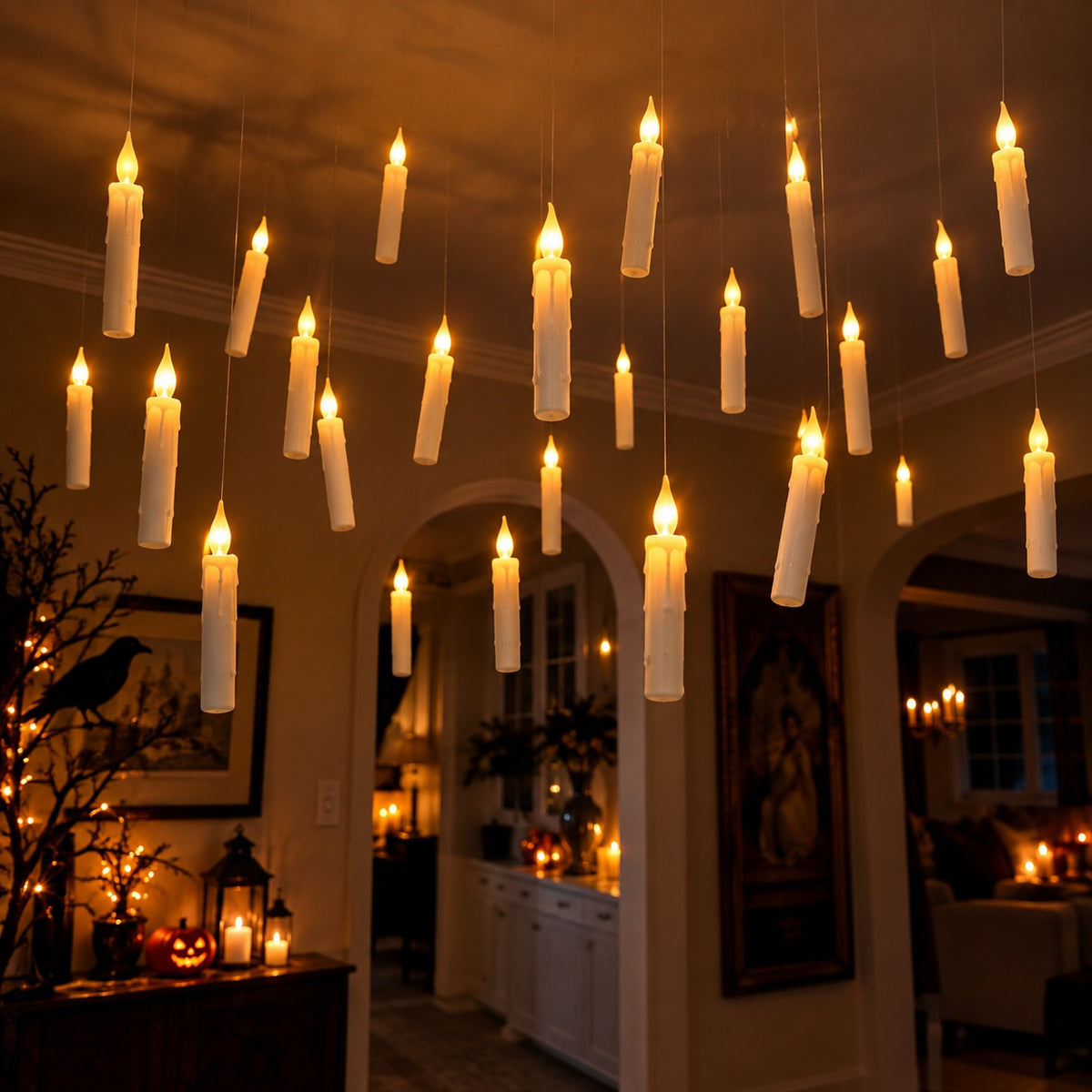 Floating LED candles glowing in a Halloween living room